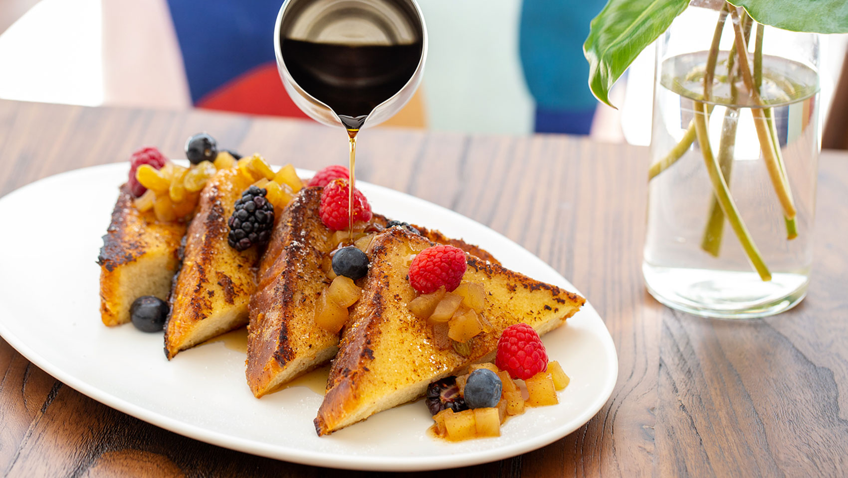 layers of french toast with syrup